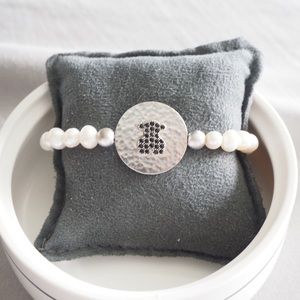 tous mother of pearl elastic bracelet faceted with spinel.